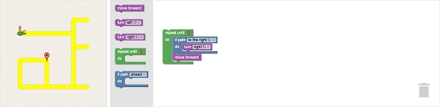 An application with a maze (the output visualization) on the left, the toolbar in the middle, and the workspace on the right.